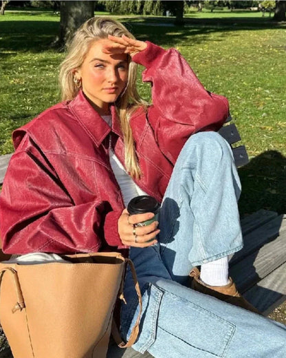 Women's burgundy oversized bomber jacket with zip front and contrast stitching