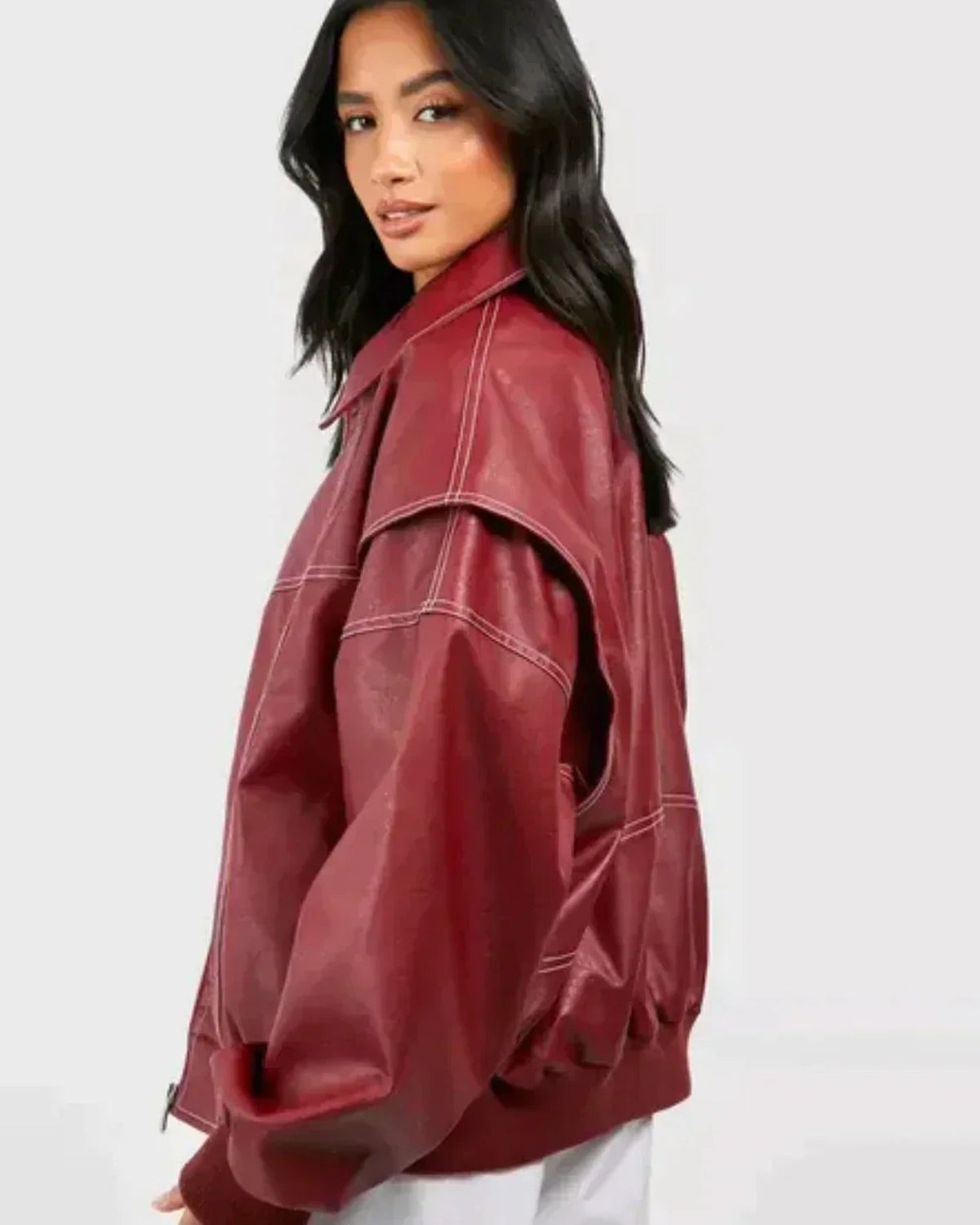 Women's burgundy oversized bomber jacket with zip front and contrast stitching