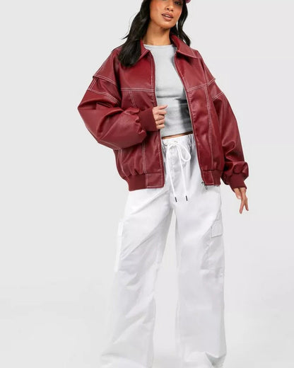 Women's burgundy oversized bomber jacket with zip front and contrast stitching