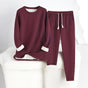 Long-sleeve crew neck sweatshirt and matching drawstring joggers with cuffed hems