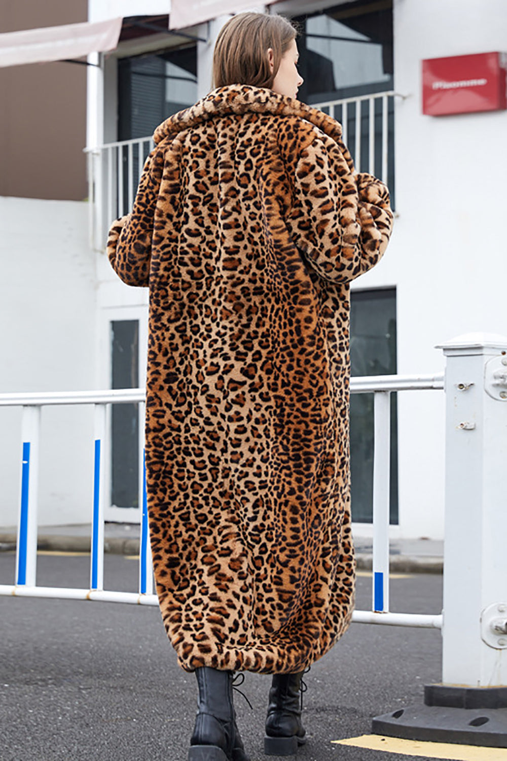 Women's long brown leopard print coat with notched lapels and long sleeves