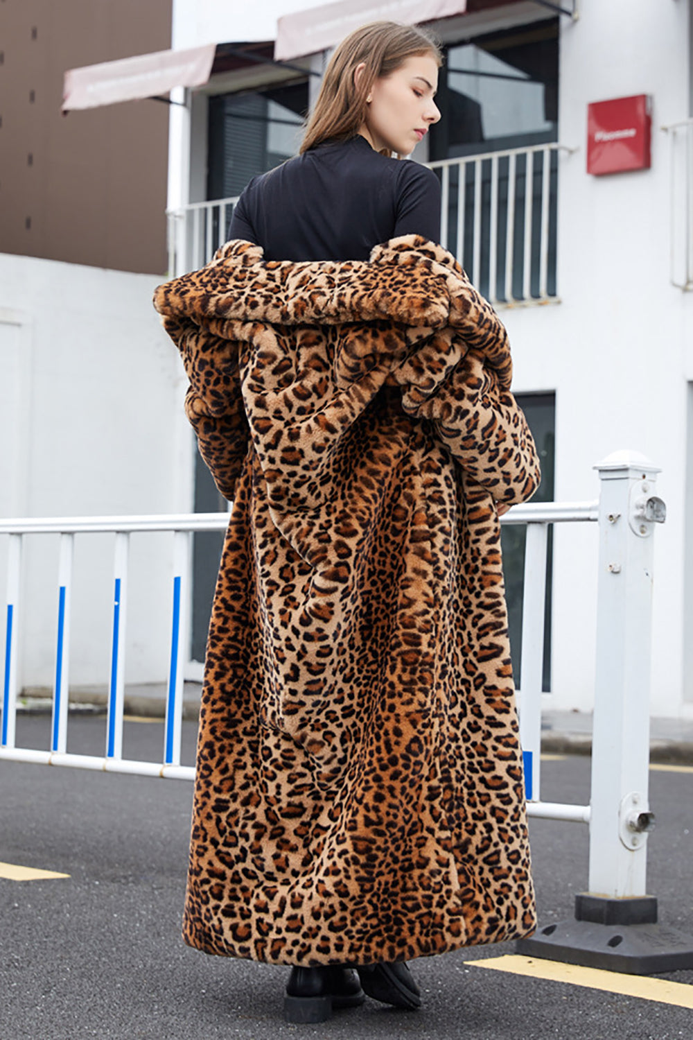 Women's long brown leopard print coat with notched lapels and long sleeves