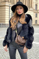 Women's black cropped jacket with faux fur panels