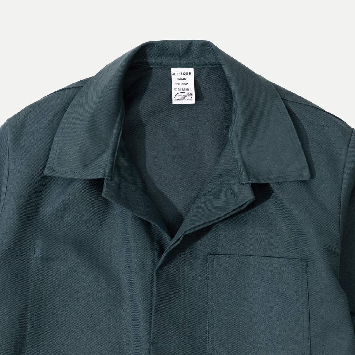Men's green utility jacket with spread collar, long sleeves and front patch pockets