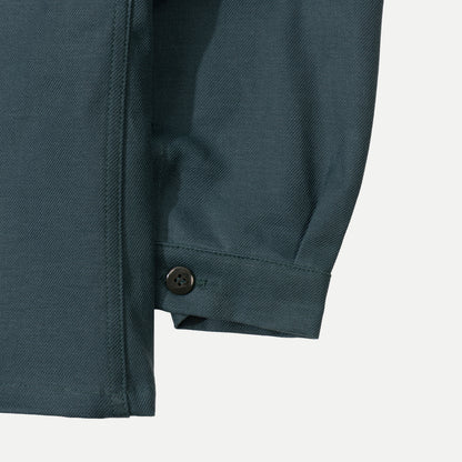 Men's green utility jacket with spread collar, long sleeves and front patch pockets