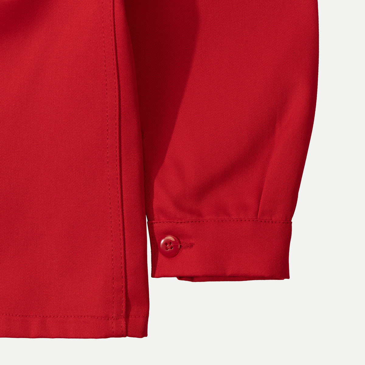 Men's red utility jacket with point collar, button front and patch pockets