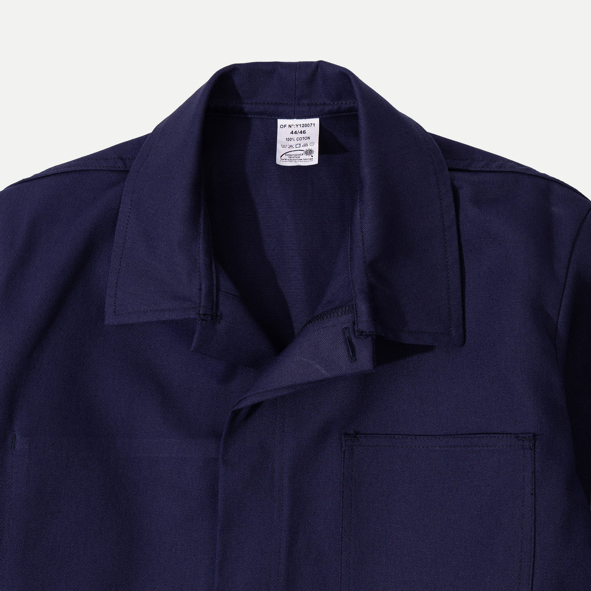 Men's navy chore jacket with button front, pointed collar and four patch pockets