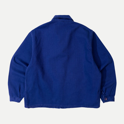 Men's blue button-front work jacket with collar and patch pockets