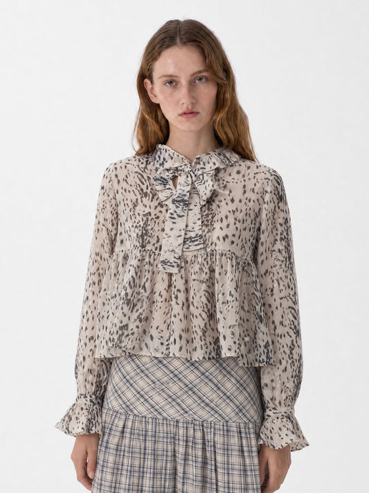 Women's beige animal print blouse with tie neckline and long sleeves