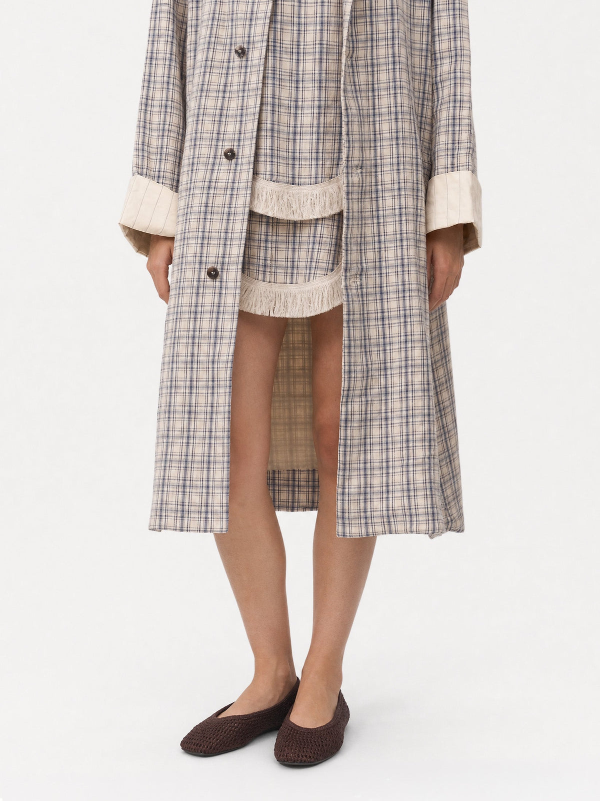Women's long checked trench coat with point collar and button front