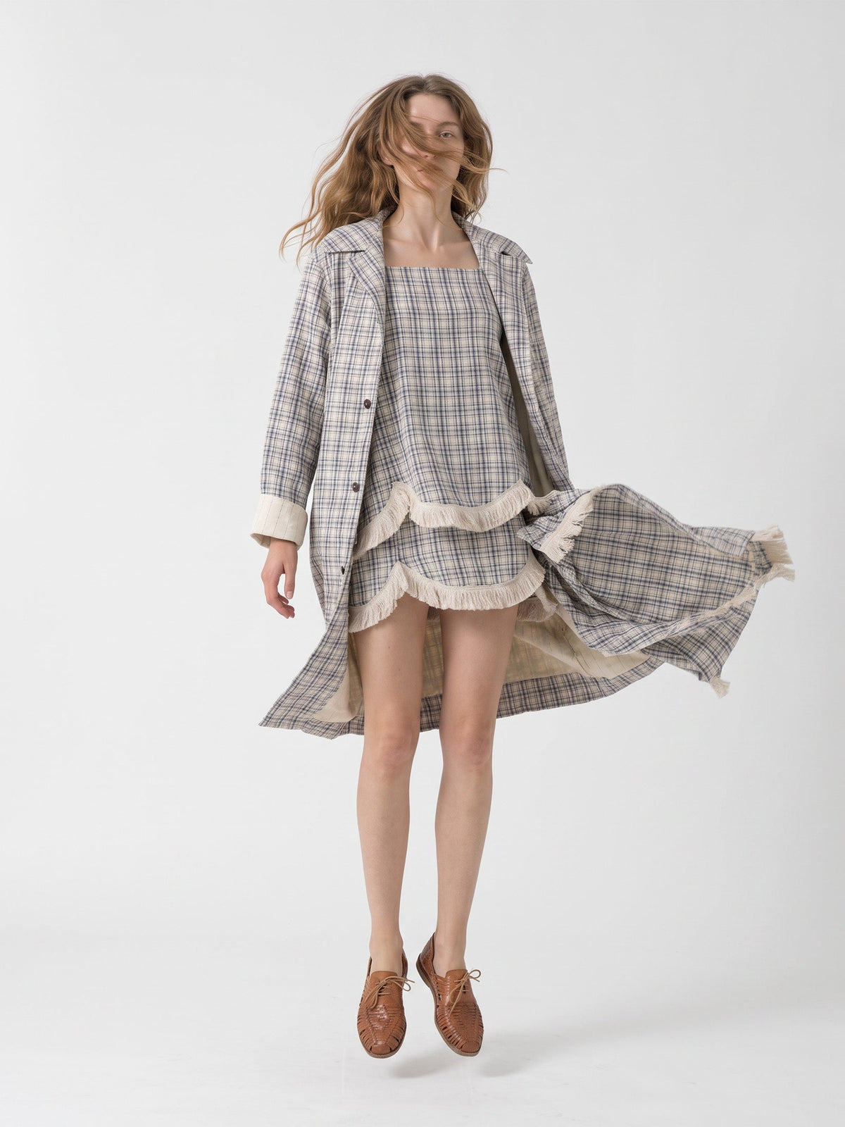 Women's long checked trench coat with point collar and button front