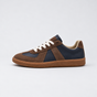 Men's low-top lace-up sneakers with textured panels and flat sole