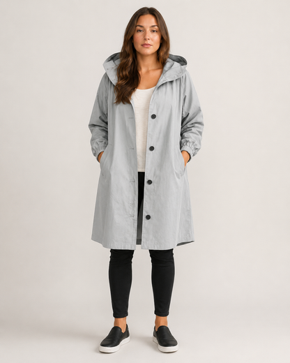 Women's hooded mid-thigh rain coat with button front and long sleeves