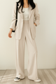 Women's tailored two-piece blazer suit with wide-leg trousers