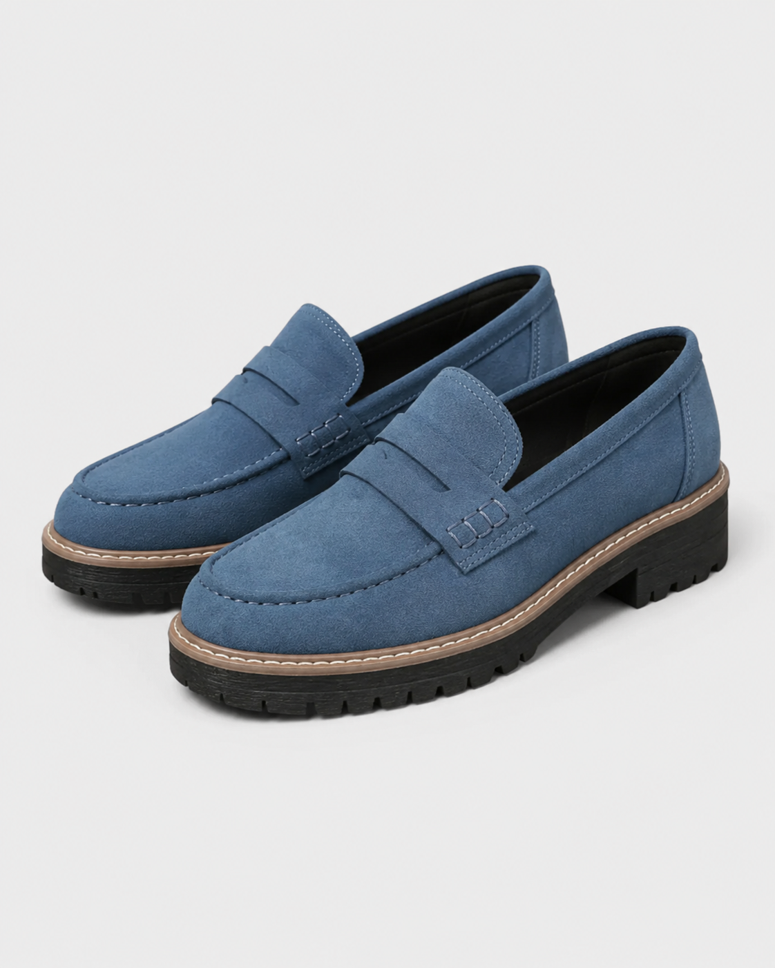 Women's slip-on loafers with penny straps, stitched trim and chunky lug soles