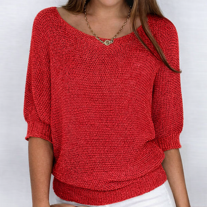 Women's ribbed knit sweater with wide neckline and three-quarter sleeves
