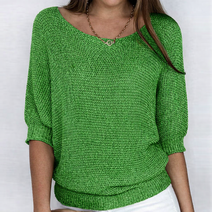 Women's ribbed knit sweater with wide neckline and three-quarter sleeves