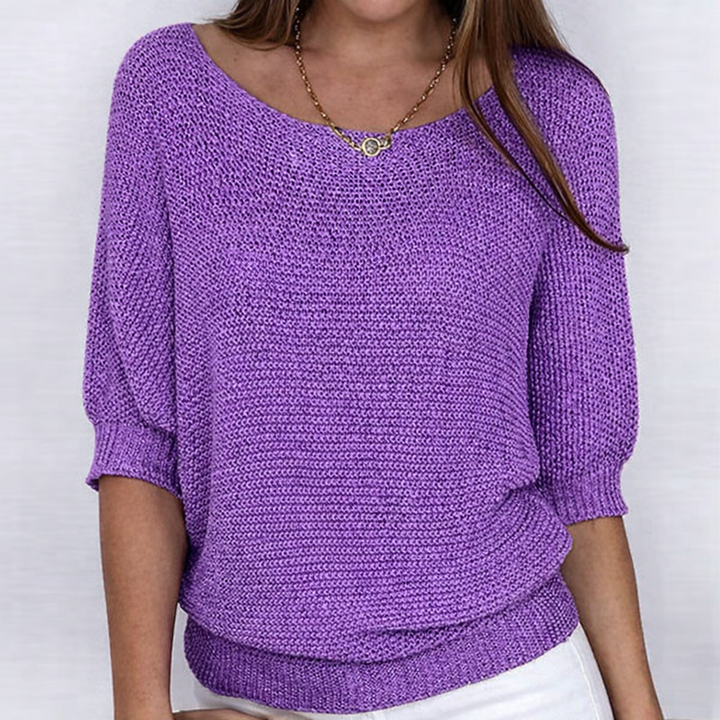 Women's ribbed knit sweater with wide neckline and three-quarter sleeves