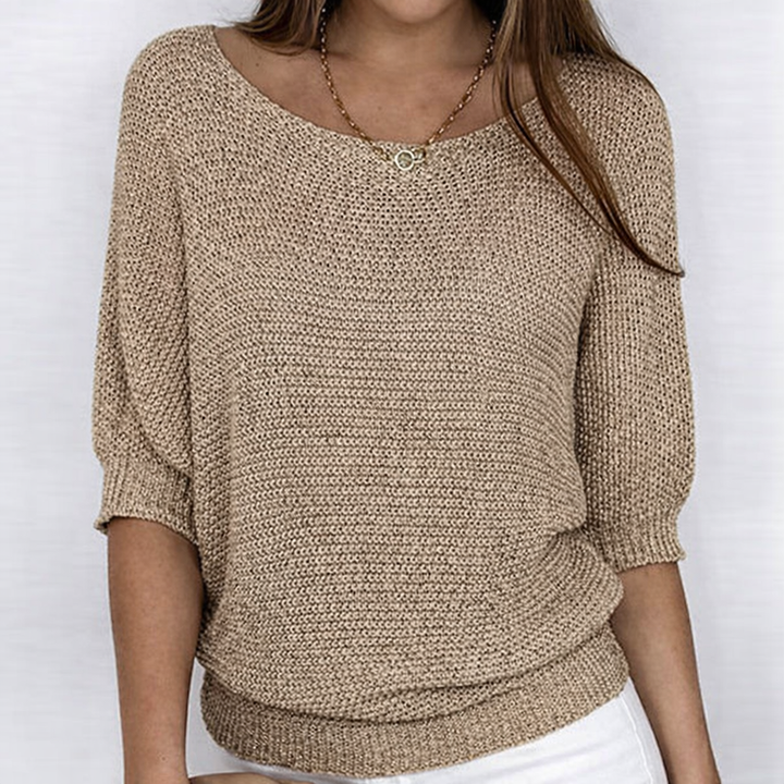 Women's ribbed knit sweater with wide neckline and three-quarter sleeves