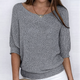 Women's ribbed knit sweater with wide neckline and three-quarter sleeves