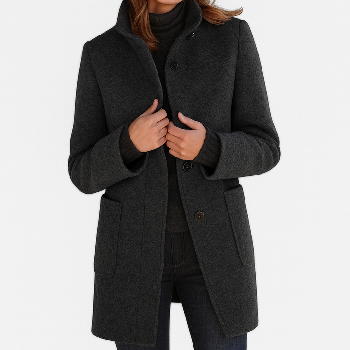 Women's solid winter coat with stand collar, button front, long sleeves and two patch pockets