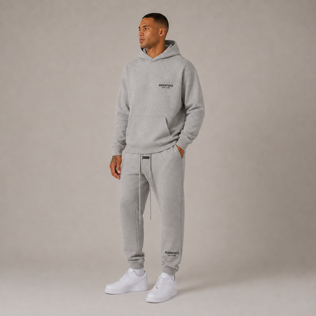 Men's gray textured hoodie and jogger trousers set