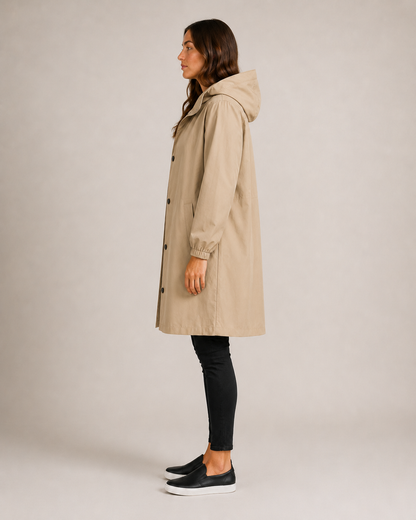 Women's hooded mid-thigh rain coat with button front and long sleeves