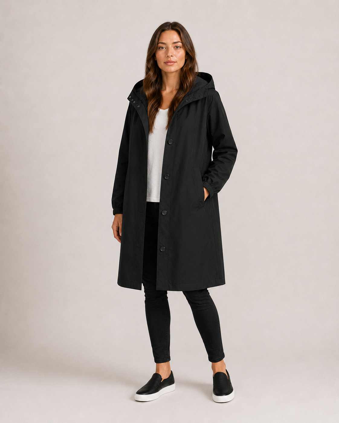 Women's hooded mid-thigh rain coat with button front and long sleeves