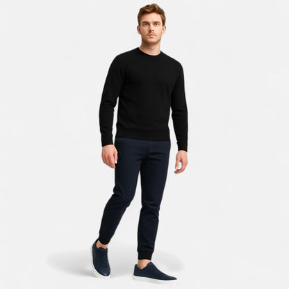 Men's low-top slip-on sneakers with stitched panels and flat white soles