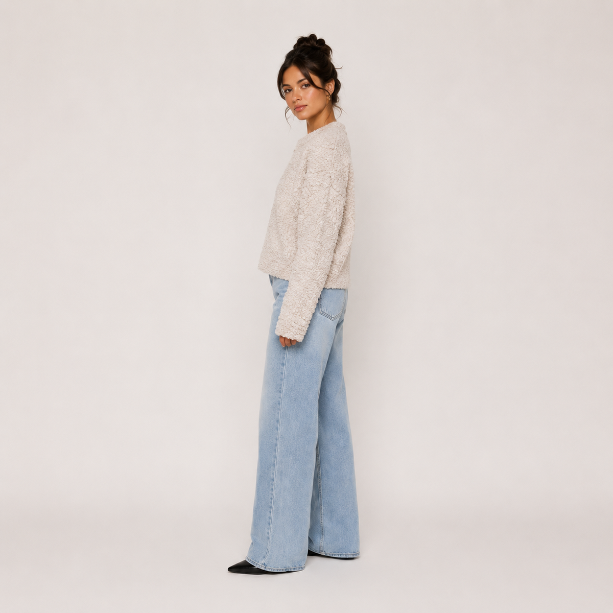 Women's beige knit jacket with crew neckline, zip front and long sleeves