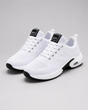 Women's textured knit lace-up sneakers with round toes and layered flat soles