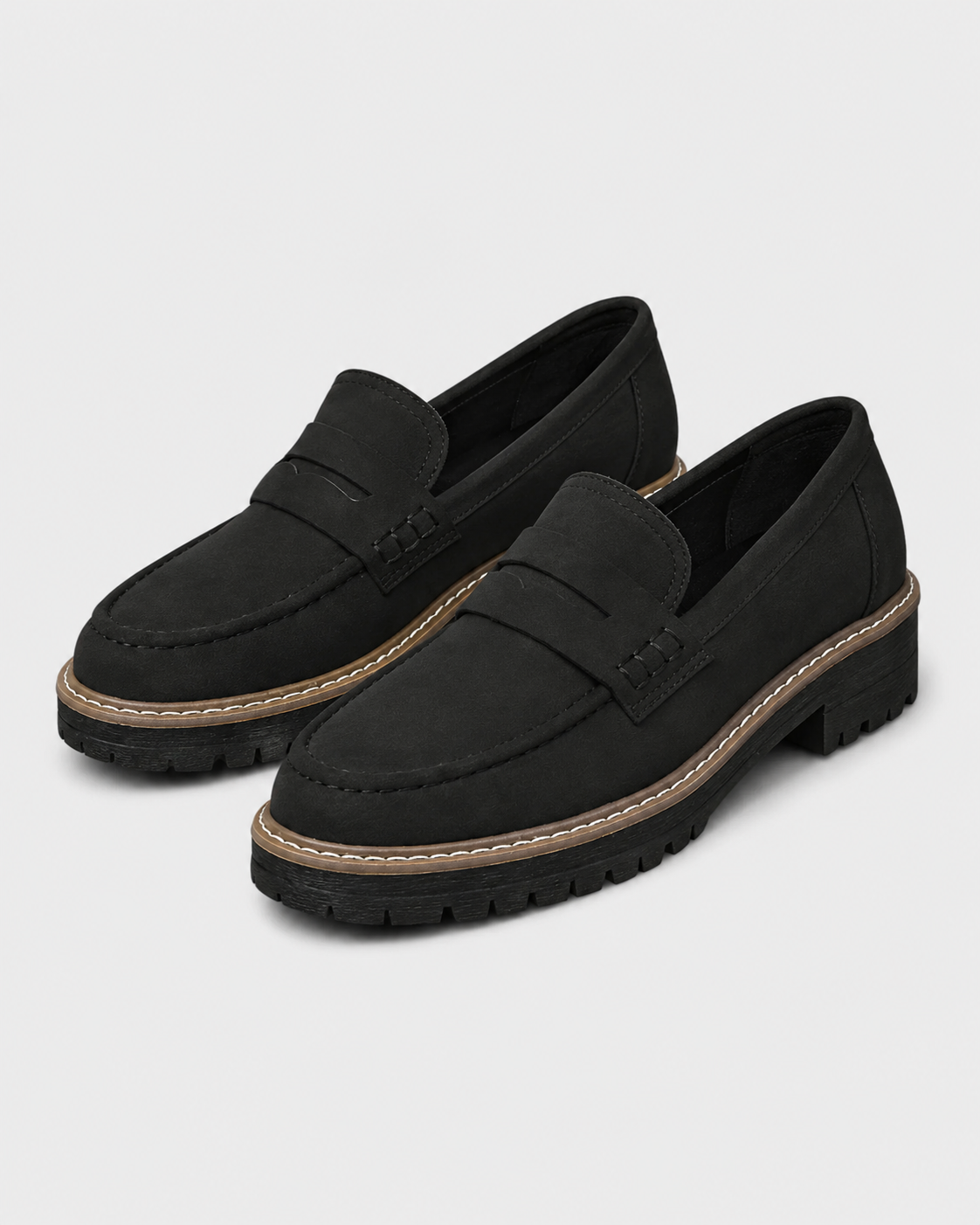 Women's slip-on loafers with penny straps, stitched trim and chunky lug soles