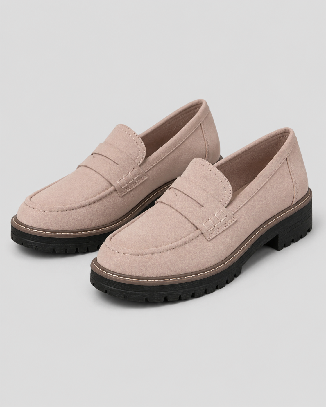 Women's slip-on loafers with penny straps, stitched trim and chunky lug soles