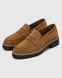 Women's slip-on loafers with penny straps, stitched trim and chunky lug soles