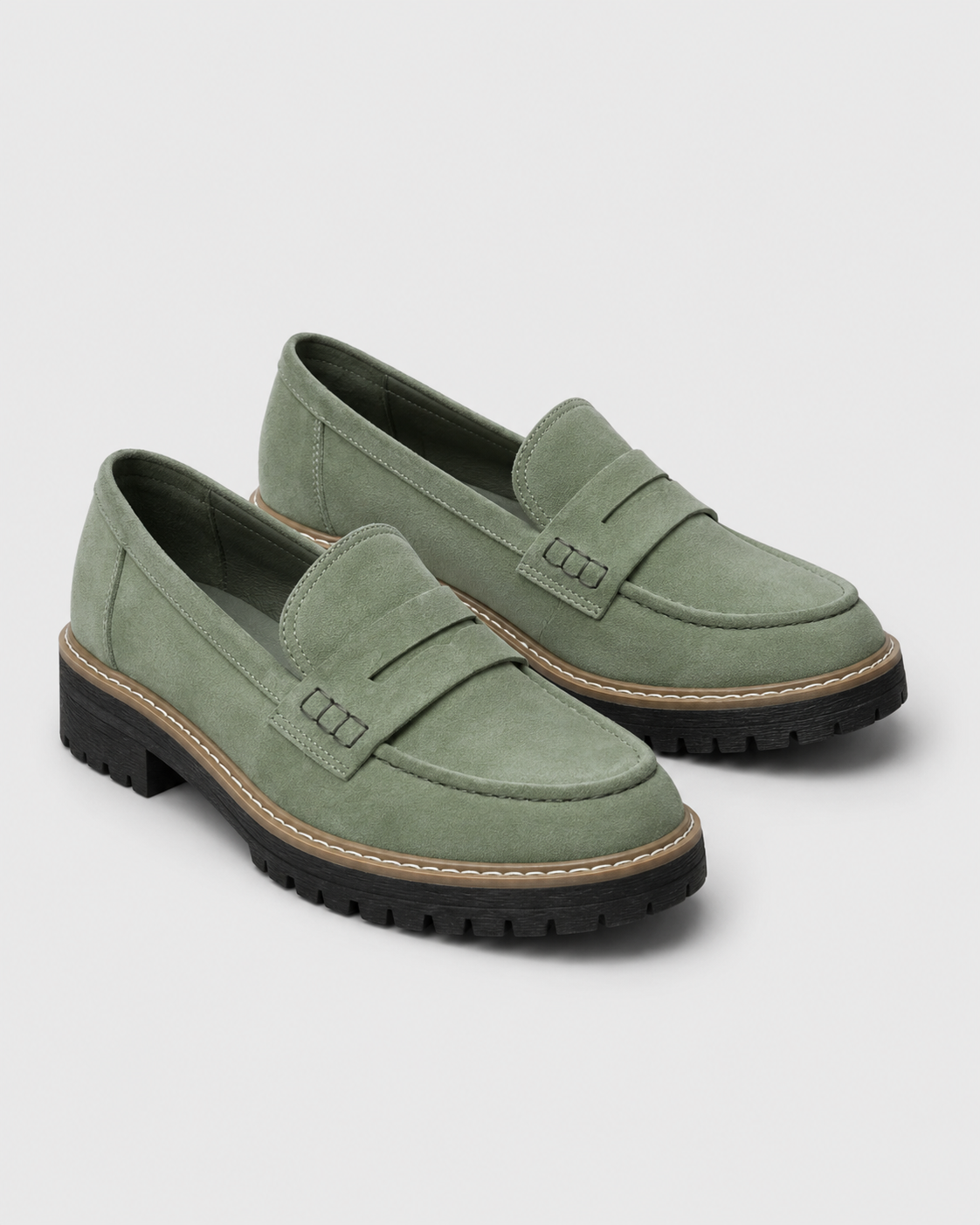Women's slip-on loafers with penny straps, stitched trim and chunky lug soles