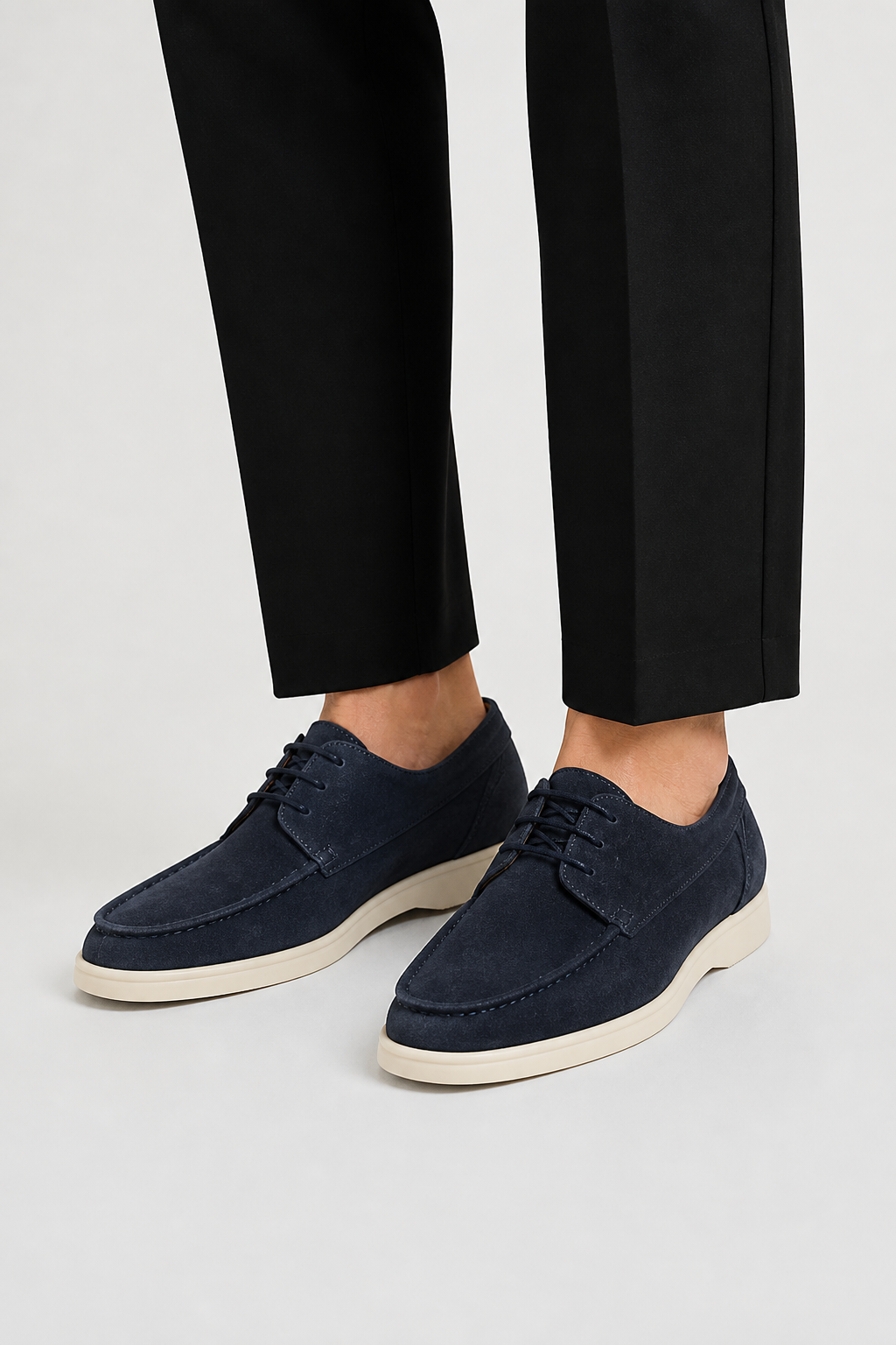 Men's lace-up loafers with moc toe stitching and contrasting flat soles