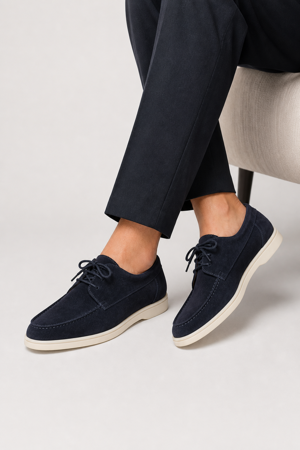 Men's lace-up loafers with moc toe stitching and contrasting flat soles
