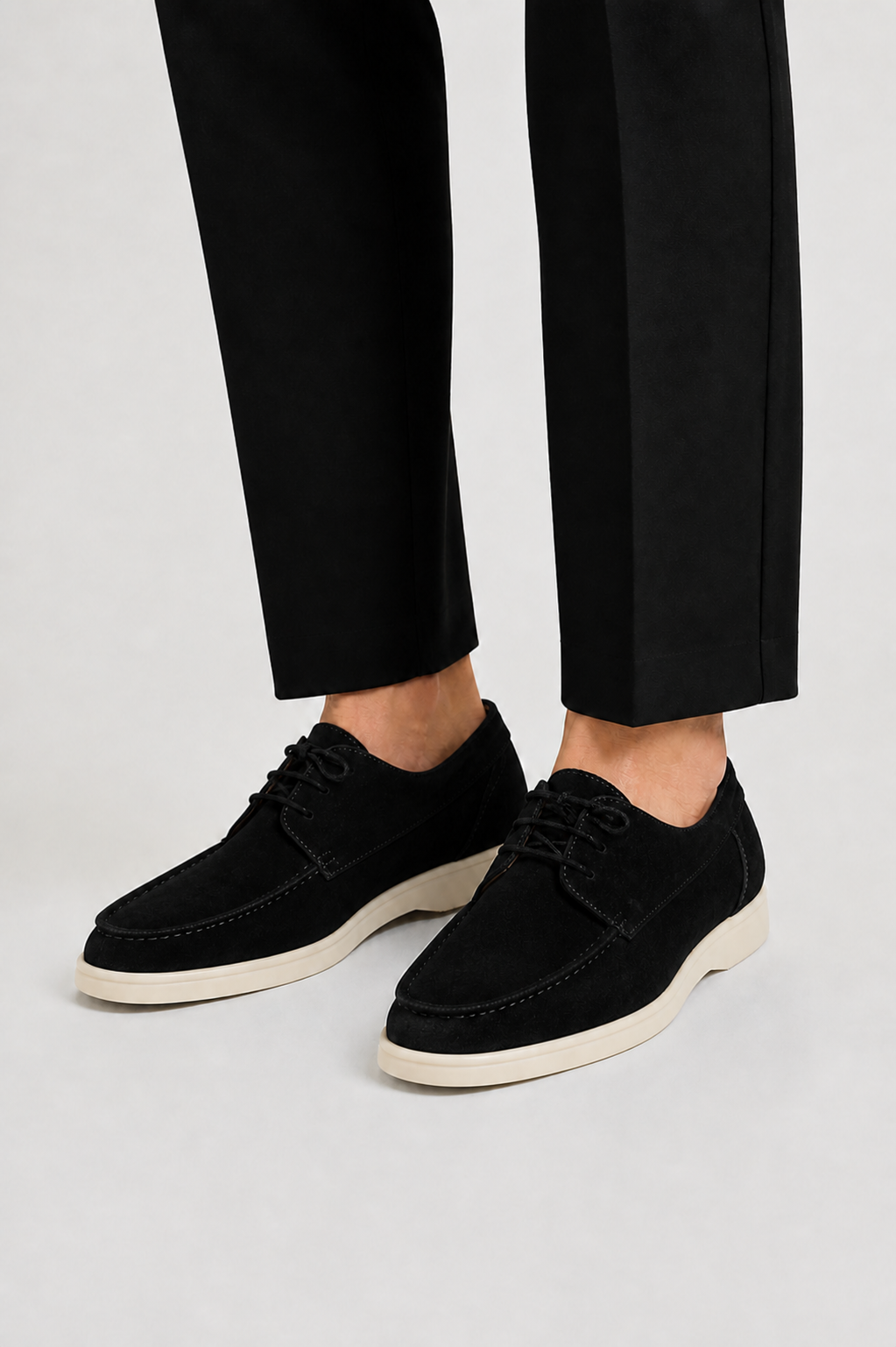 Men's lace-up loafers with moc toe stitching and contrasting flat soles