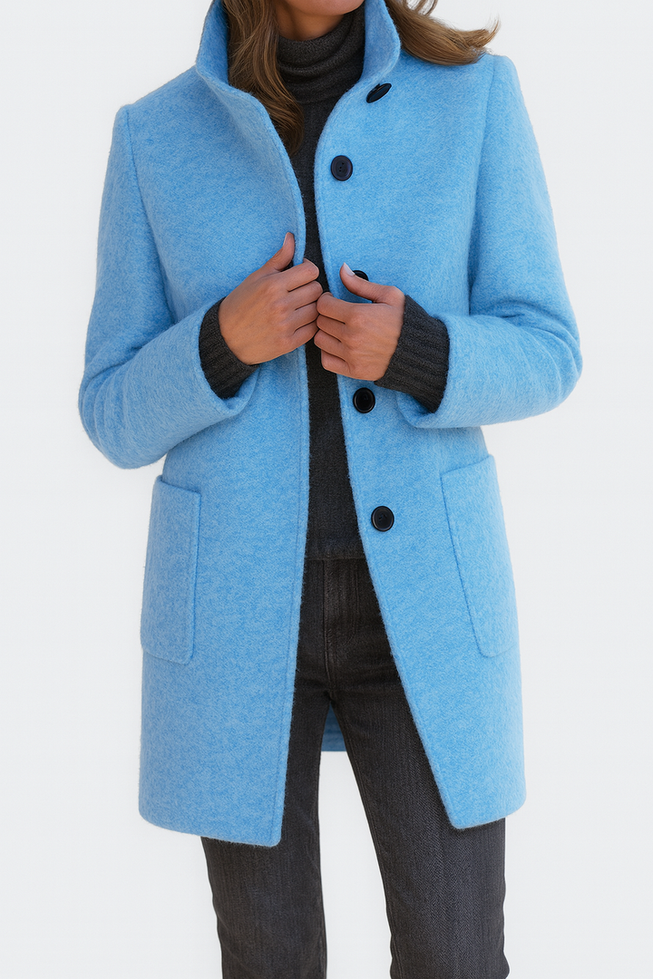 Women's solid winter coat with stand collar, button front, long sleeves and two patch pockets