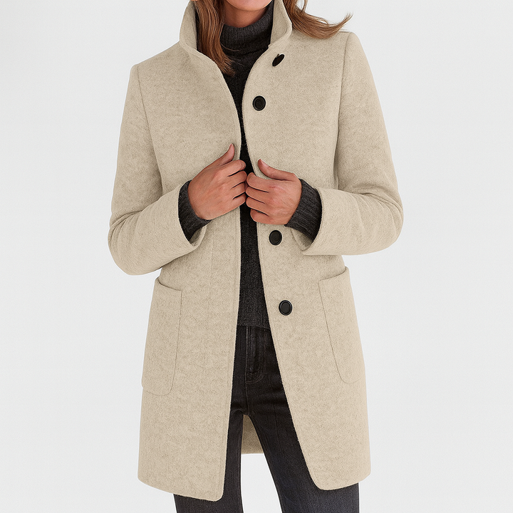 Women's solid winter coat with stand collar, button front, long sleeves and two patch pockets