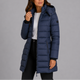 Women's knee-length hooded quilted puffer coat with long sleeves and zip pockets