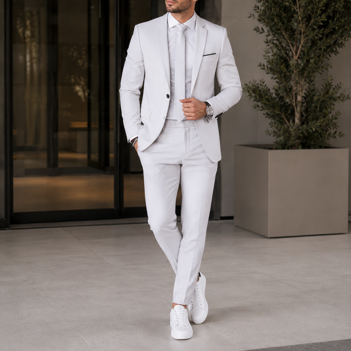 Men's two-piece suit with notch-lapel blazer, matching trousers and long sleeves
