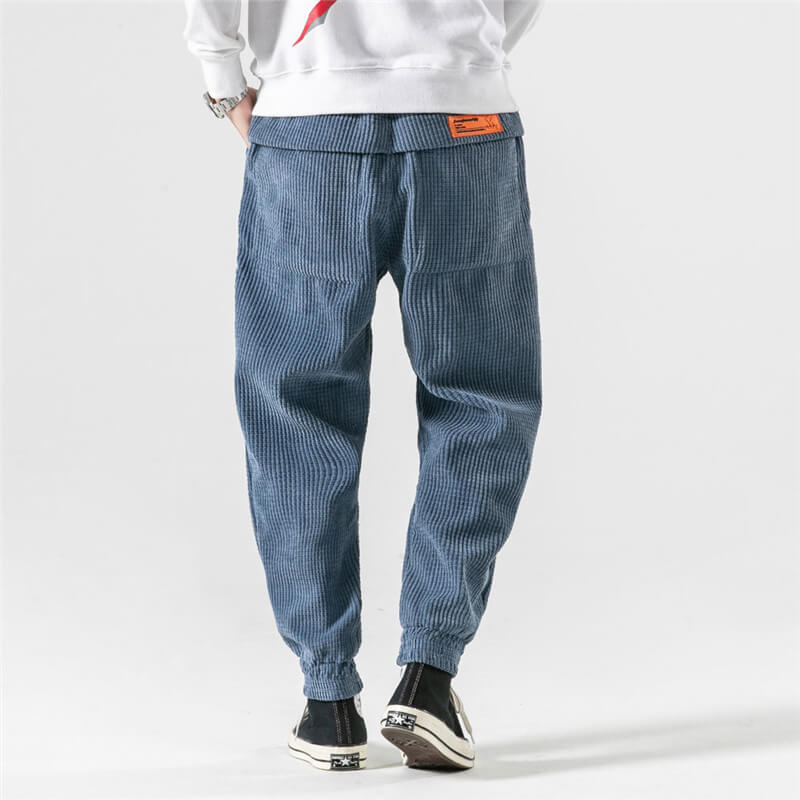 Men's textured corduroy jogger trousers with elasticated ankle cuffs