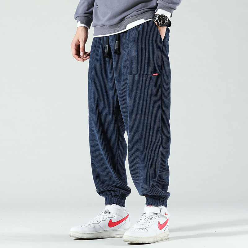 Men's textured corduroy jogger trousers with elasticated ankle cuffs