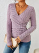 Women's ribbed wrap top with V-neckline and long sleeves