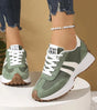 Low-top striped lace-up sneakers with contrasting panels and textured soles