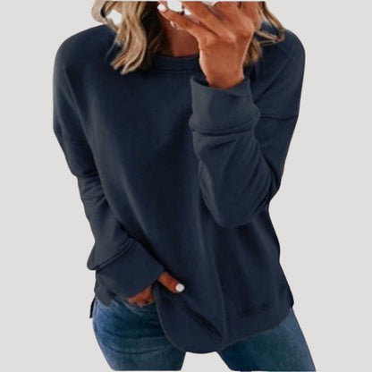 Women's oversized long sleeve crew neck sweater with a longer back hem