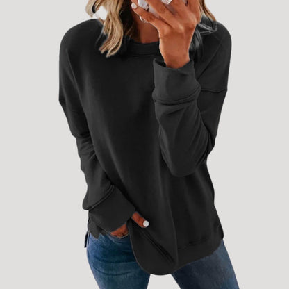Women's oversized long sleeve crew neck sweater with a longer back hem