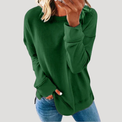 Women's oversized long sleeve crew neck sweater with a longer back hem