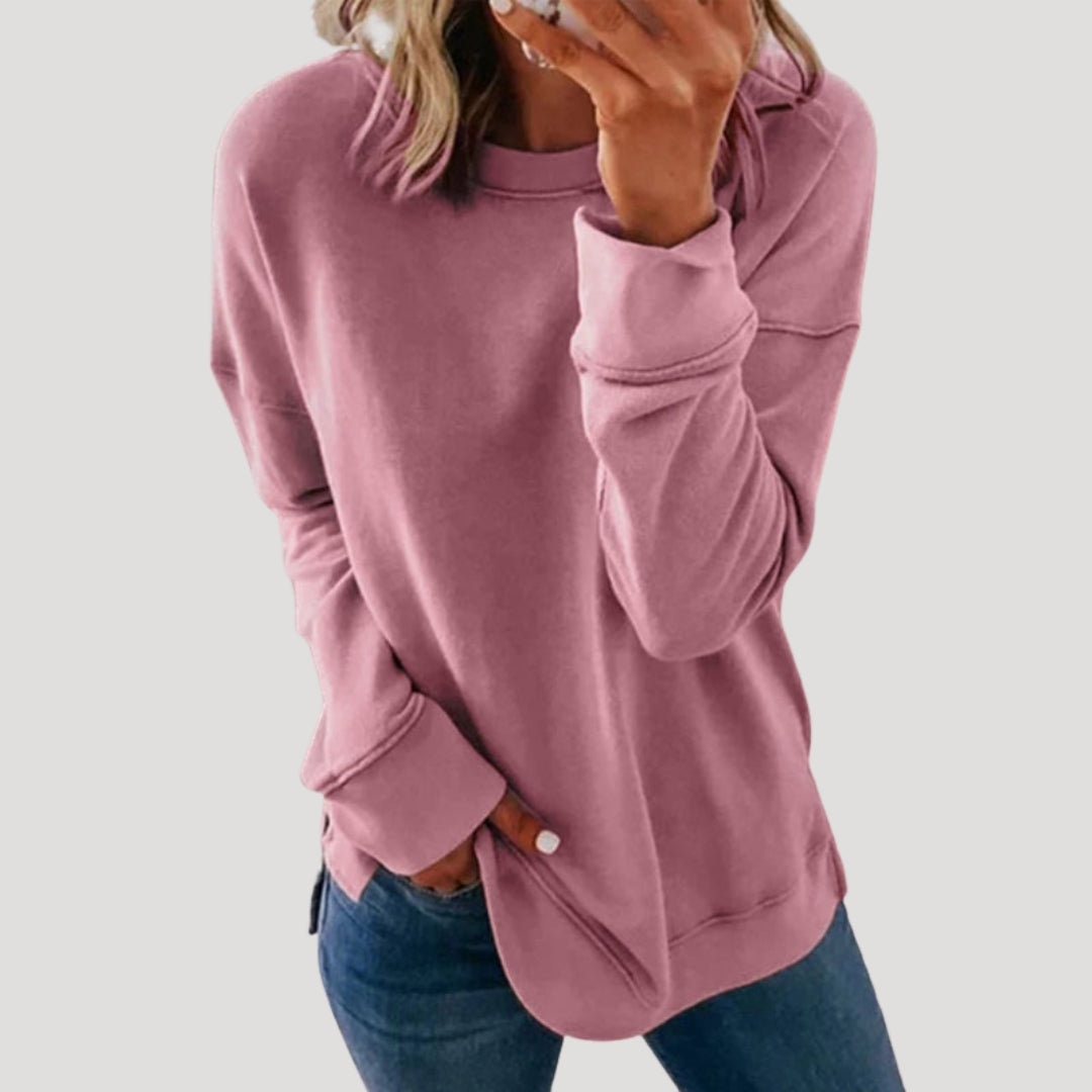 Women's oversized long sleeve crew neck sweater with a longer back hem